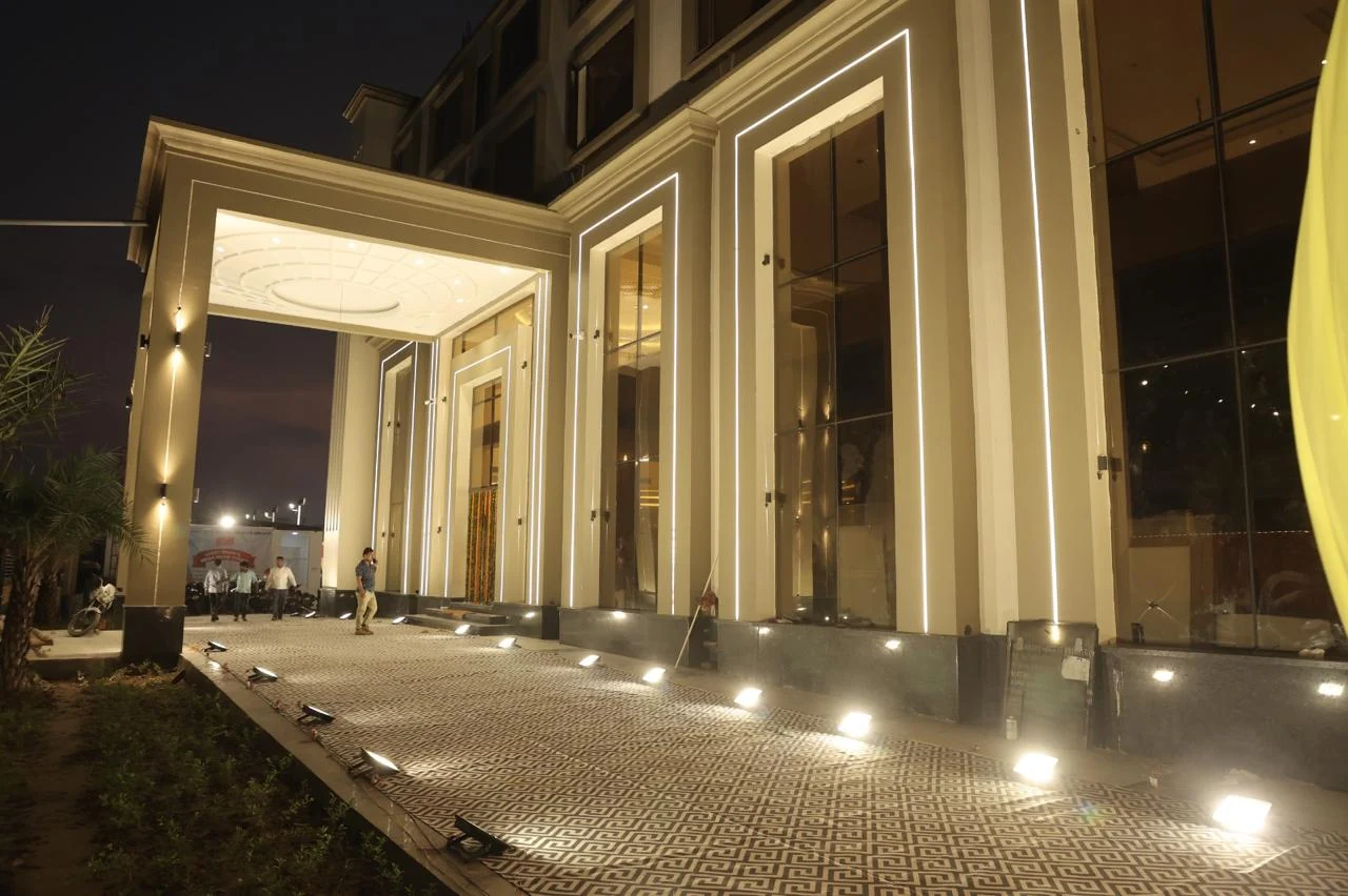 Elegant swimming pool with loungers and poolside service